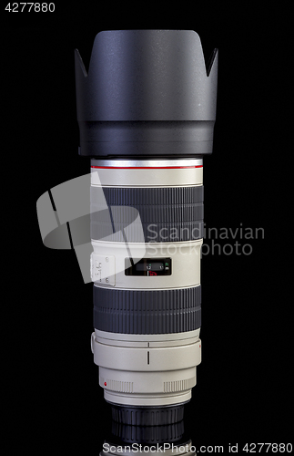 Image of Camera photo lens over black 