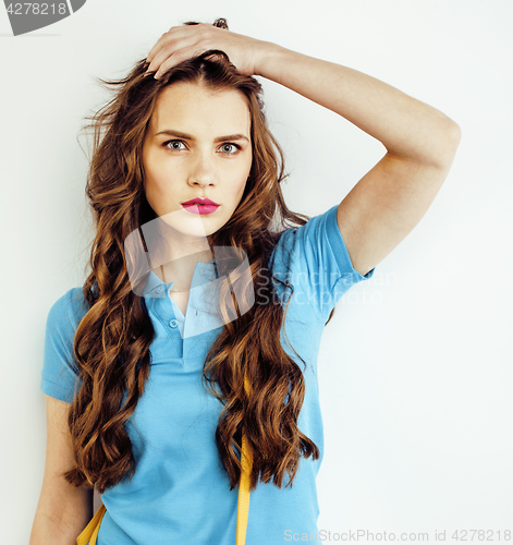 Image of young pretty long hair woman happy smiling isolated on white background, wearing cute tiny fashion handbag, lifestyle people concept 