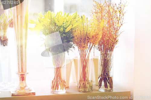 Image of close up of flowers in vases at flower shop