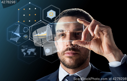 Image of businessman with transparent smartphone