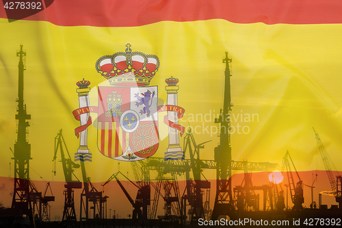 Image of Industrial concept with Spain flag at sunset