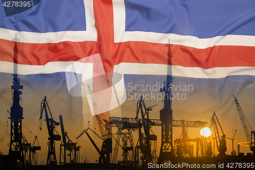 Image of Industrial concept with Iceland flag at sunset