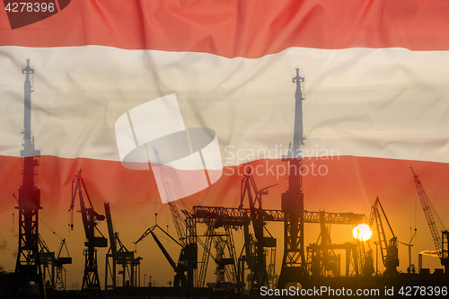 Image of Industrial concept with Austria flag at sunset
