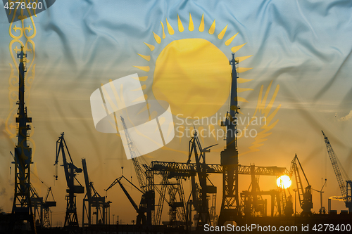 Image of Industrial concept with Kazakhstan flag at sunset