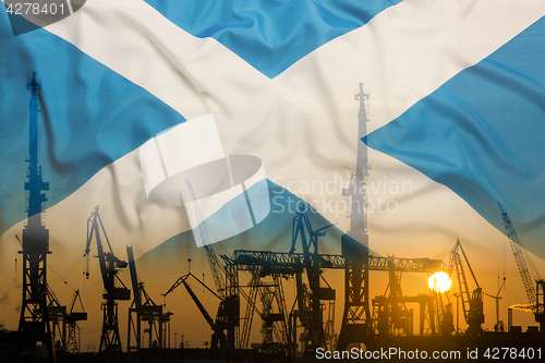 Image of Industrial concept with Scotland flag at sunset