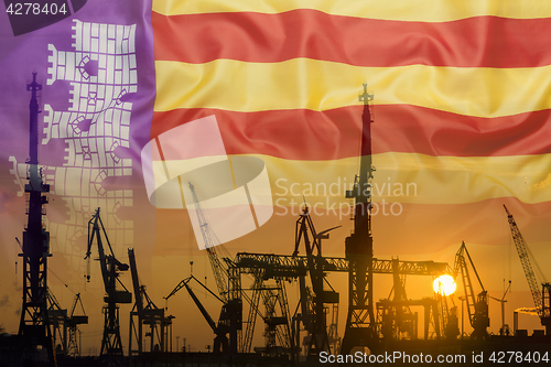 Image of Industrial concept with Mallorca flag at sunset