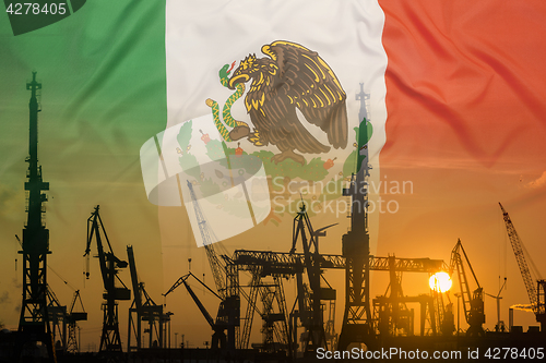 Image of Industrial concept with Malaysia\r\r flag at sunset