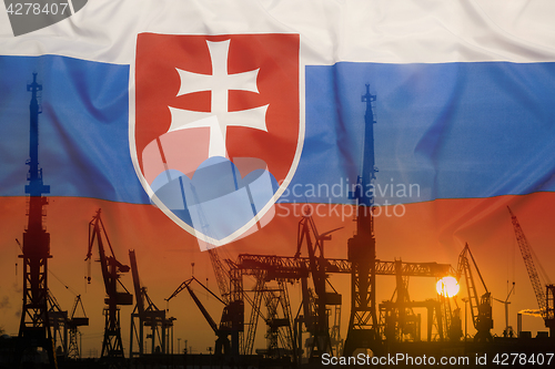 Image of Industrial concept with Slovakia flag at sunset