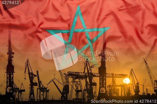 Image of Industrial concept with Morocco flag at sunset