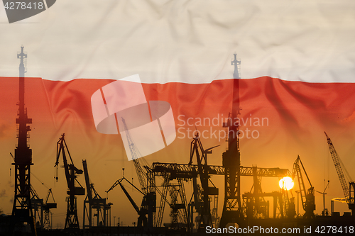 Image of Industrial concept with Poland flag at sunset