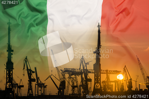 Image of Industrial concept with Italy flag at sunset