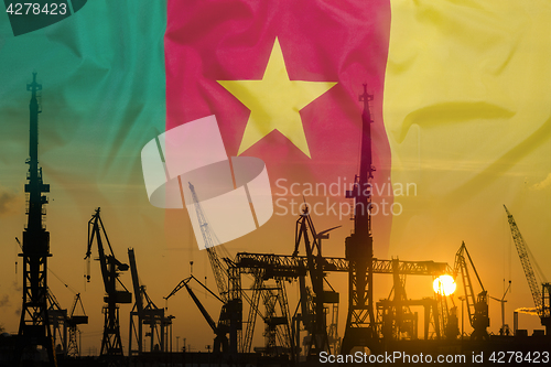 Image of Industrial concept with Cameroon flag at sunset