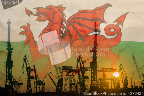 Image of Industrial concept with Wales flag at sunset