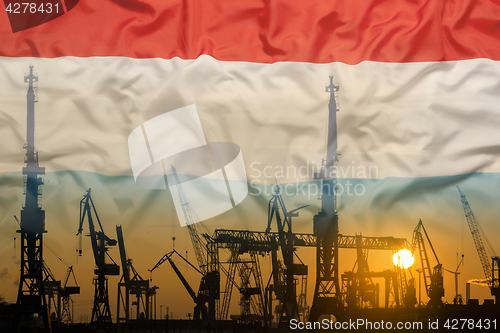 Image of Industrial concept with Luxembourg\r flag at sunset