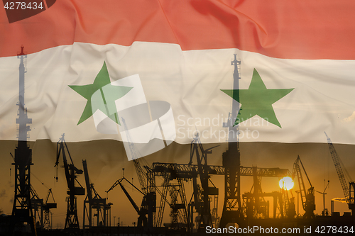 Image of Industrial concept with Syria flag at sunset