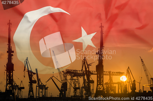 Image of Industrial concept with Turkey flag at sunset