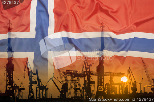 Image of Industrial concept with Norway flag at sunset