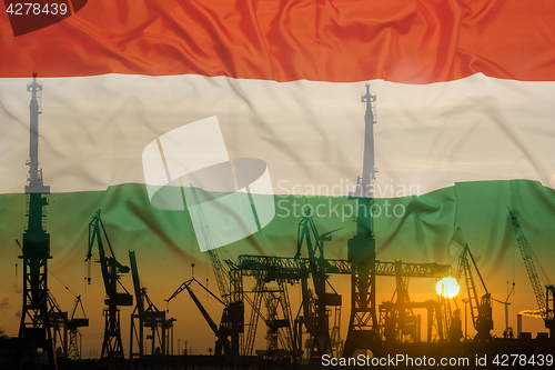 Image of Industrial concept with Hungary flag at sunset