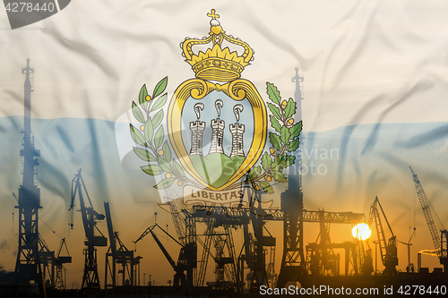 Image of Industrial concept with San Marino flag at sunset