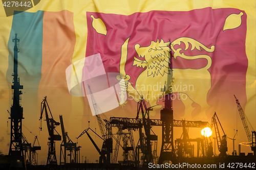 Image of Industrial concept with Sri Lanka flag at sunset