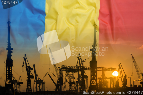 Image of Industrial concept with Romania flag at sunset