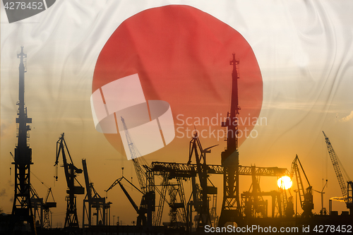 Image of Industrial concept with Japan flag at sunset