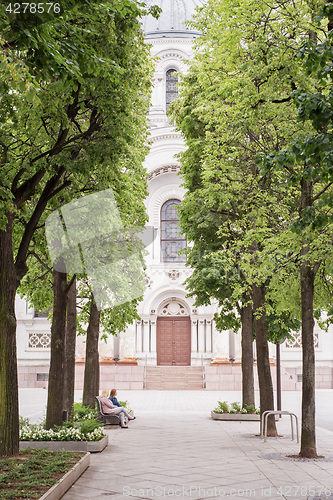 Image of Avenue surrounded by trees in summer