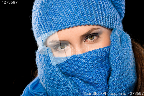 Image of Young happy woman wearing winter cloth