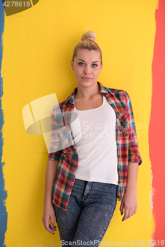 Image of young woman over color background