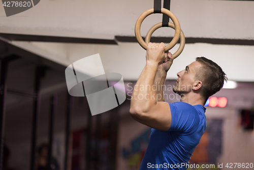 Image of man doing dipping exercise