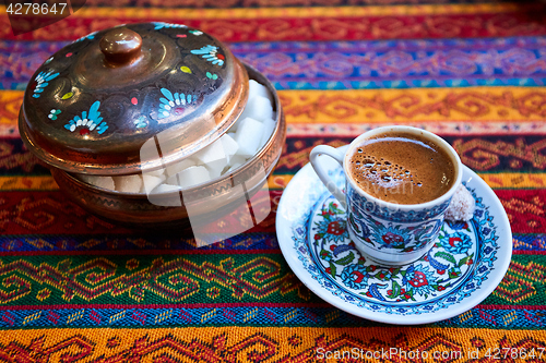 Image of A cup of turkish coffee on the table