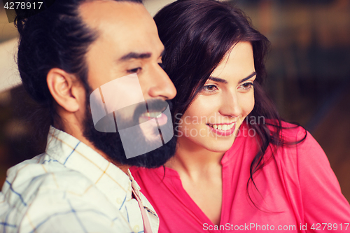 Image of happy couple at restaurant