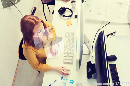 Image of smiling businesswoman or student with computer