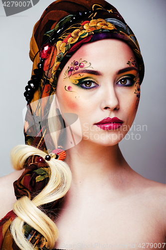 Image of portrait of contemporary noblewoman with face art creative close