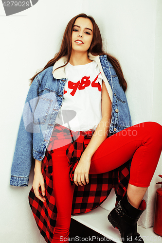 Image of young pretty stylish hipster girl posing emotional isolated on white background happy smiling cool smile, lifestyle people concept 