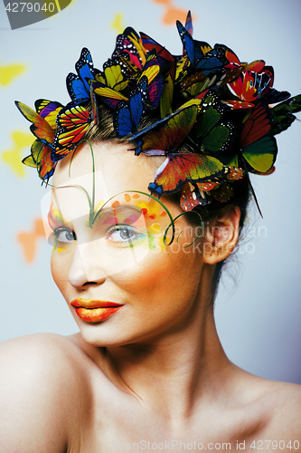 Image of woman with summer creative make up like fairy butterfly closeup 