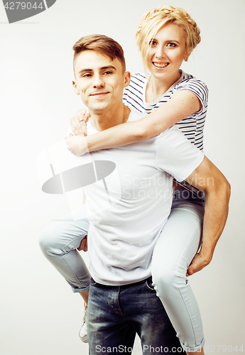 Image of young pretty teenage couple, hipster guy with his girlfriend happy smiling and hugging isolated on white background, lifestyle people concept