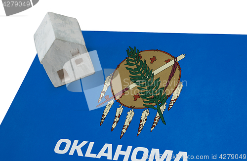 Image of Small house on a flag - Oklahoma