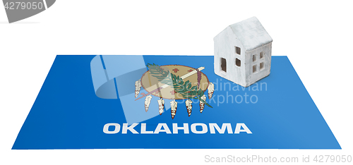 Image of Small house on a flag - Oklahoma