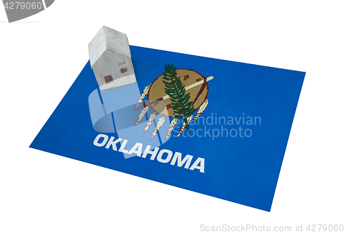 Image of Small house on a flag - Oklahoma