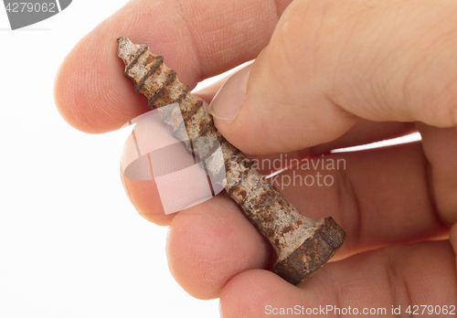 Image of Rusted old screw isolated