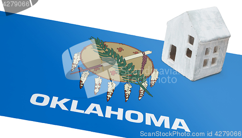 Image of Small house on a flag - Oklahoma