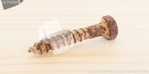 Image of Rusted old screw isolated