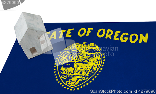 Image of Small house on a flag - Oregon