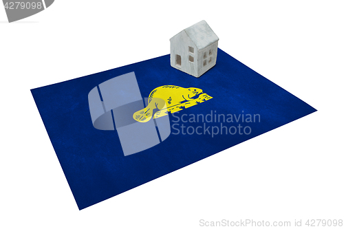 Image of Small house on a flag - Oregon