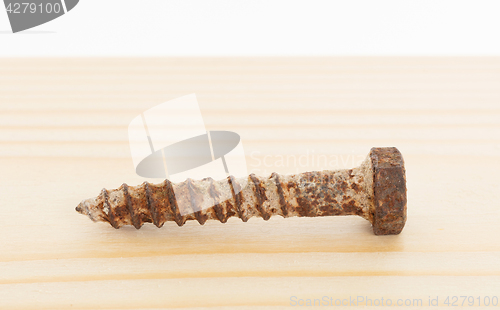 Image of Rusted old screw isolated