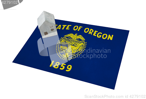 Image of Small house on a flag - Oregon