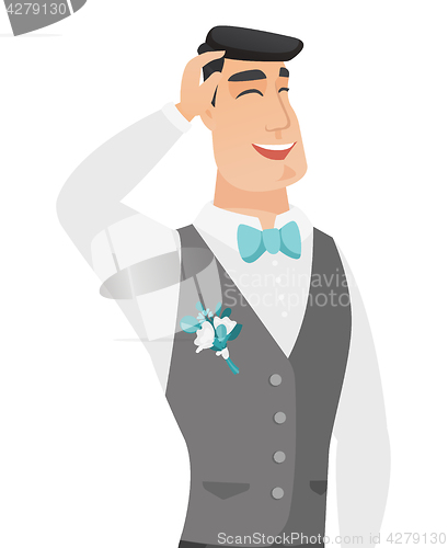 Image of Young caucasian groom laughing.