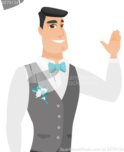 Image of Young caucasian groom waving his hand.