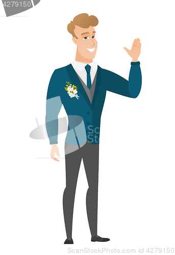 Image of Young caucasian groom waving his hand.